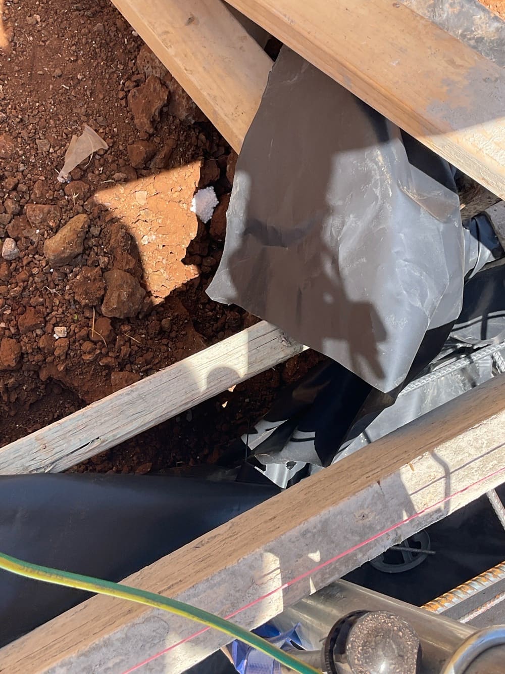 Adjust the vapour barrier, recorded during a slab pre-pour inspection in Aintree