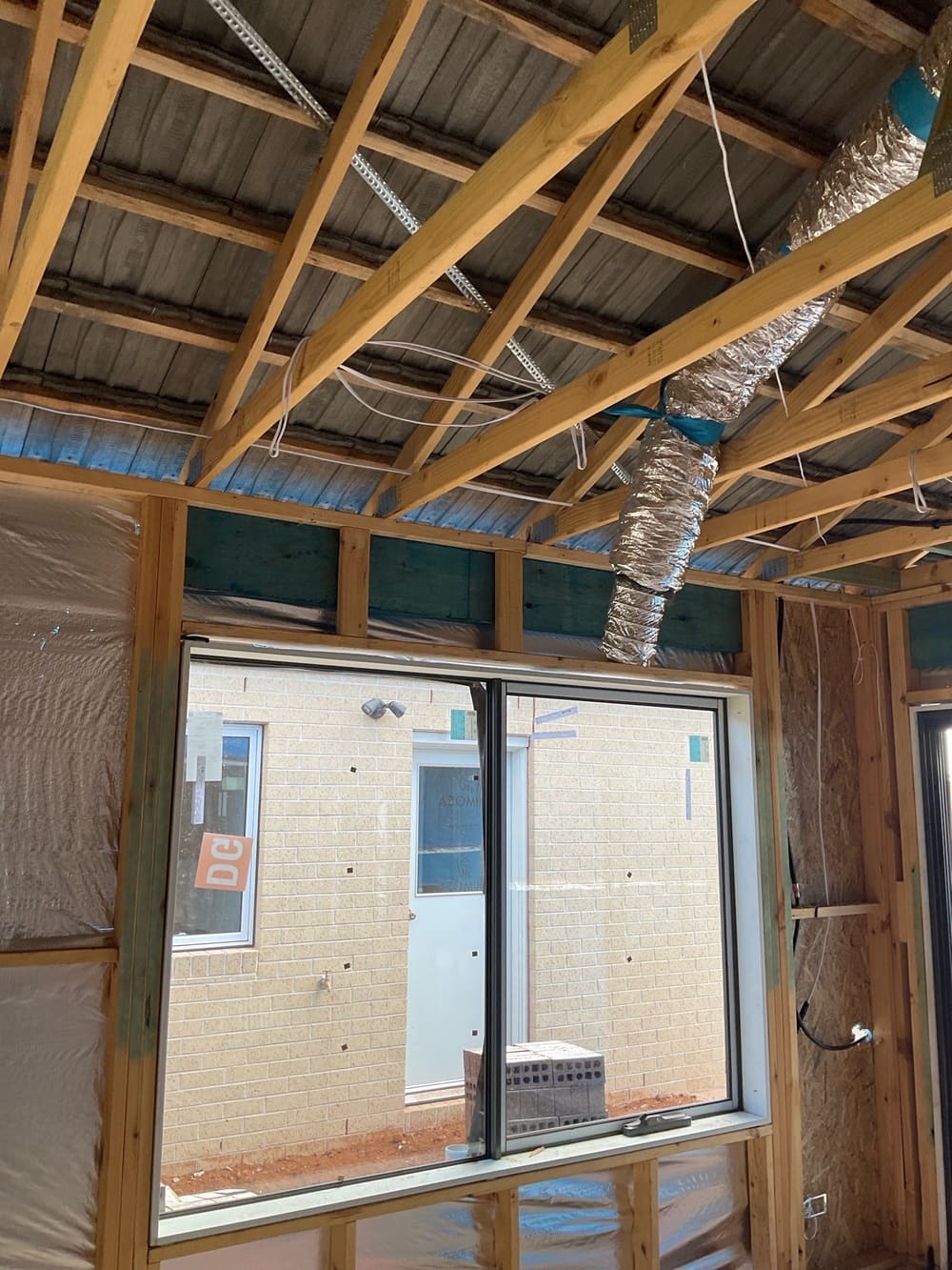 Not installed wall and ceiling insulation, recorded during a lock-up inspection in Aintree