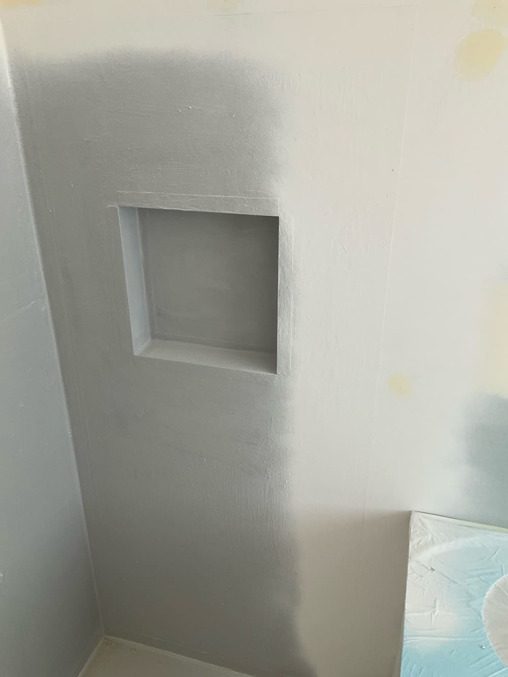Waterproofing covered with paint, recorded during a waterproofing inspection in Ocean Grove